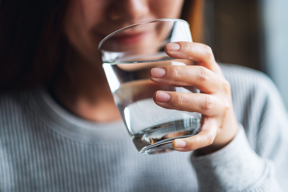 Woman drinking clean water
